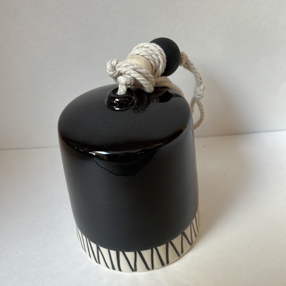 Ceramic windchime bell - white and black design. Great for indoor or outdoor.